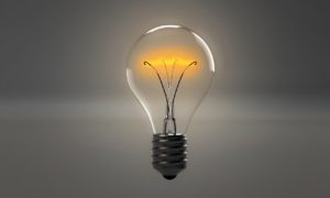 Glowing Lightbulb - Symbolizing Ideas and Innovation