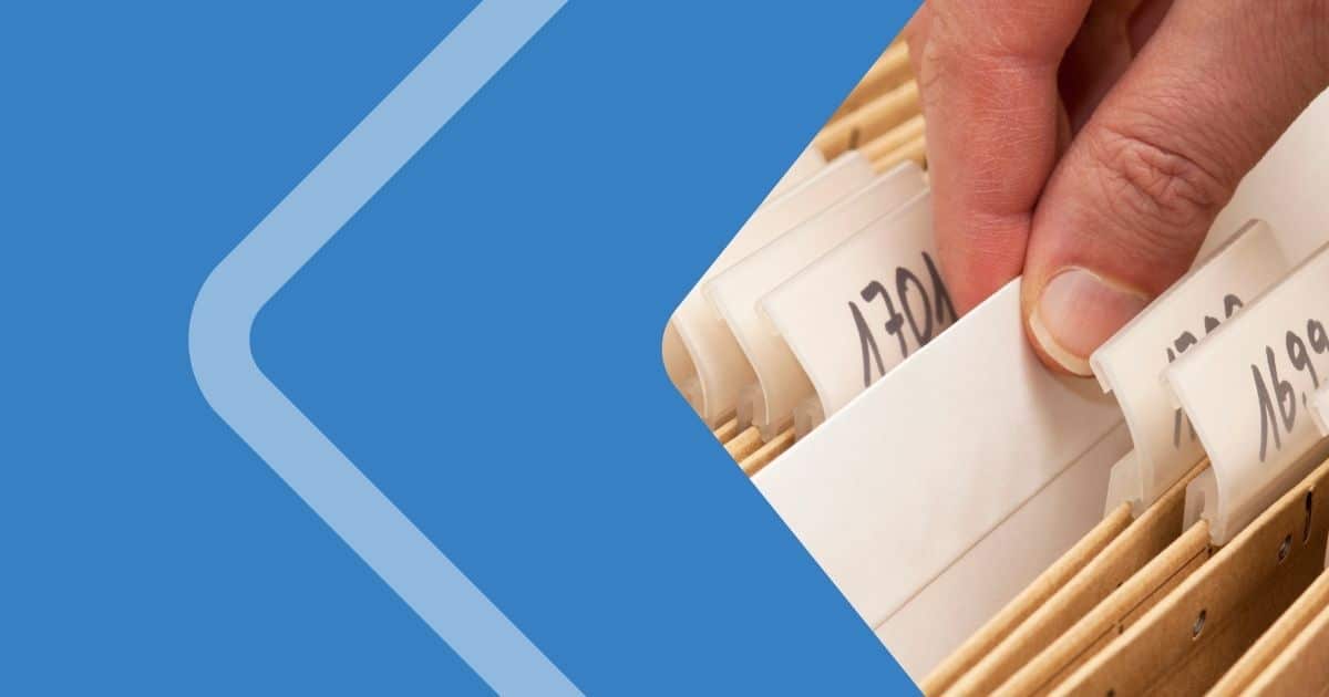 Moving from Paper Tax Records to Digital Compliance Files organised in a filing cabinet illustrating the shift from paper-based records to digital tax compliance and document management.